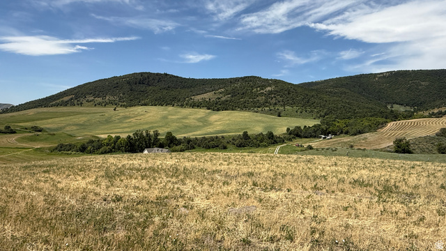5588 East Glendale Road Preston, ID 83263 - Photo 2 of 11 Expansive rural landscape featuring rolling hills and distant mountains