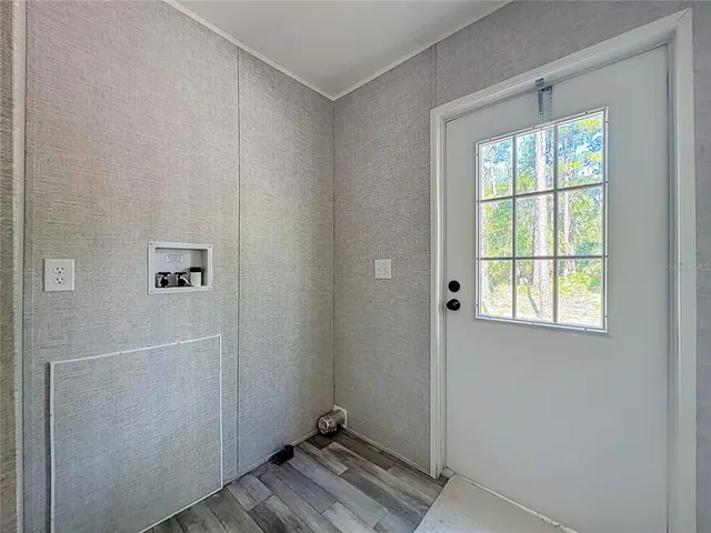 a view of wooden fence and trees