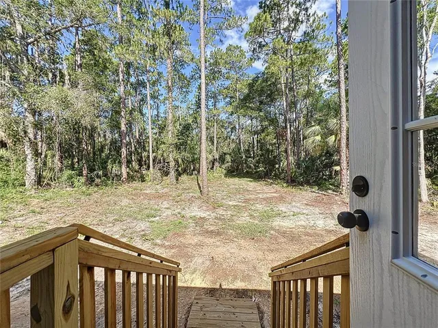 a house with yard in front of it