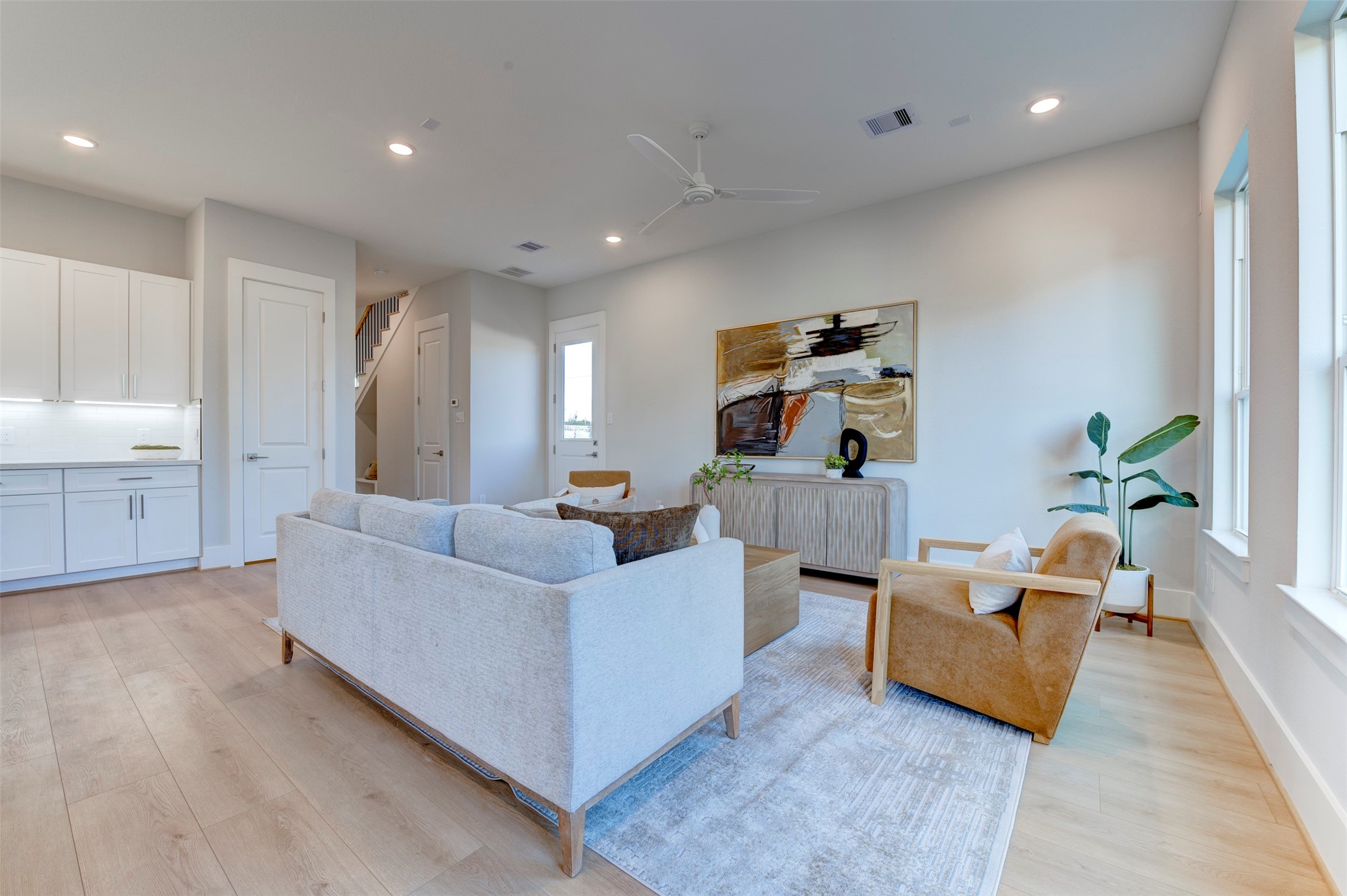 5128 Rosslyn Road Houston, TX 77018 - Photo 11 of 40 a living room with furniture and a flat screen tv