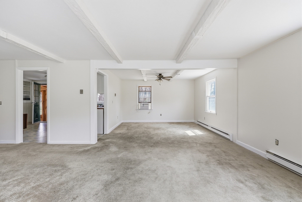240 Upper Road Deerfield, MA 01342 - Photo 12 of 42 a view of a big room with closet and windows