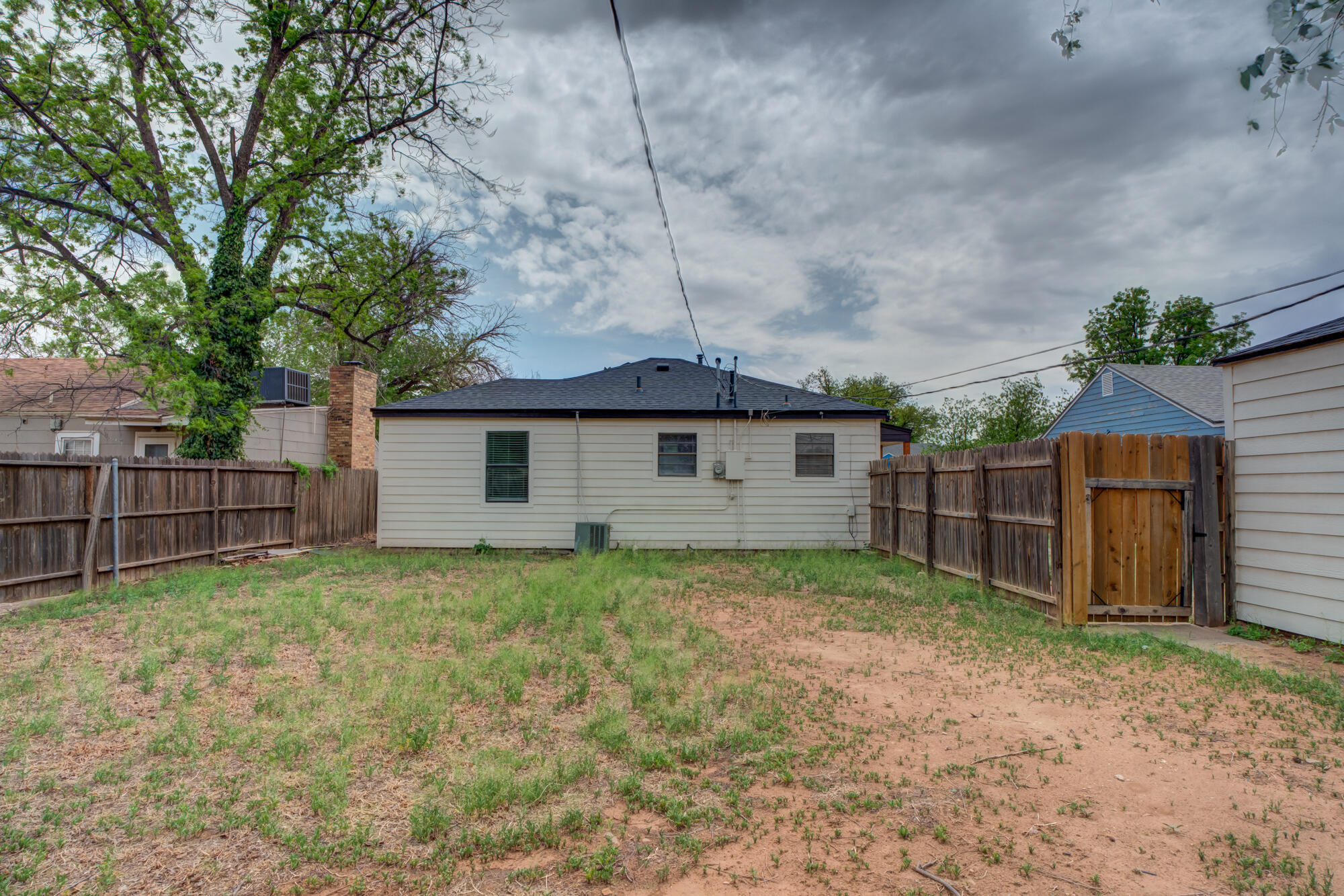 2308 30th Street Lubbock, TX 79411 - Photo 20 of 21 a view of a backyard