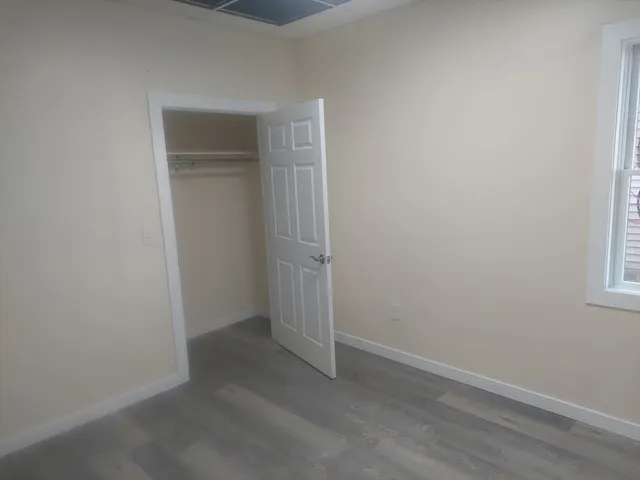 an empty room with windows