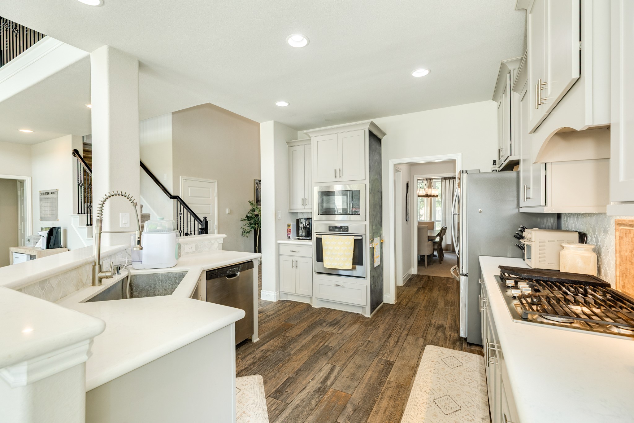 3706 Arpa Street Rosharon, TX 77583 - Photo 15 of 50 a large kitchen with a table and chairs