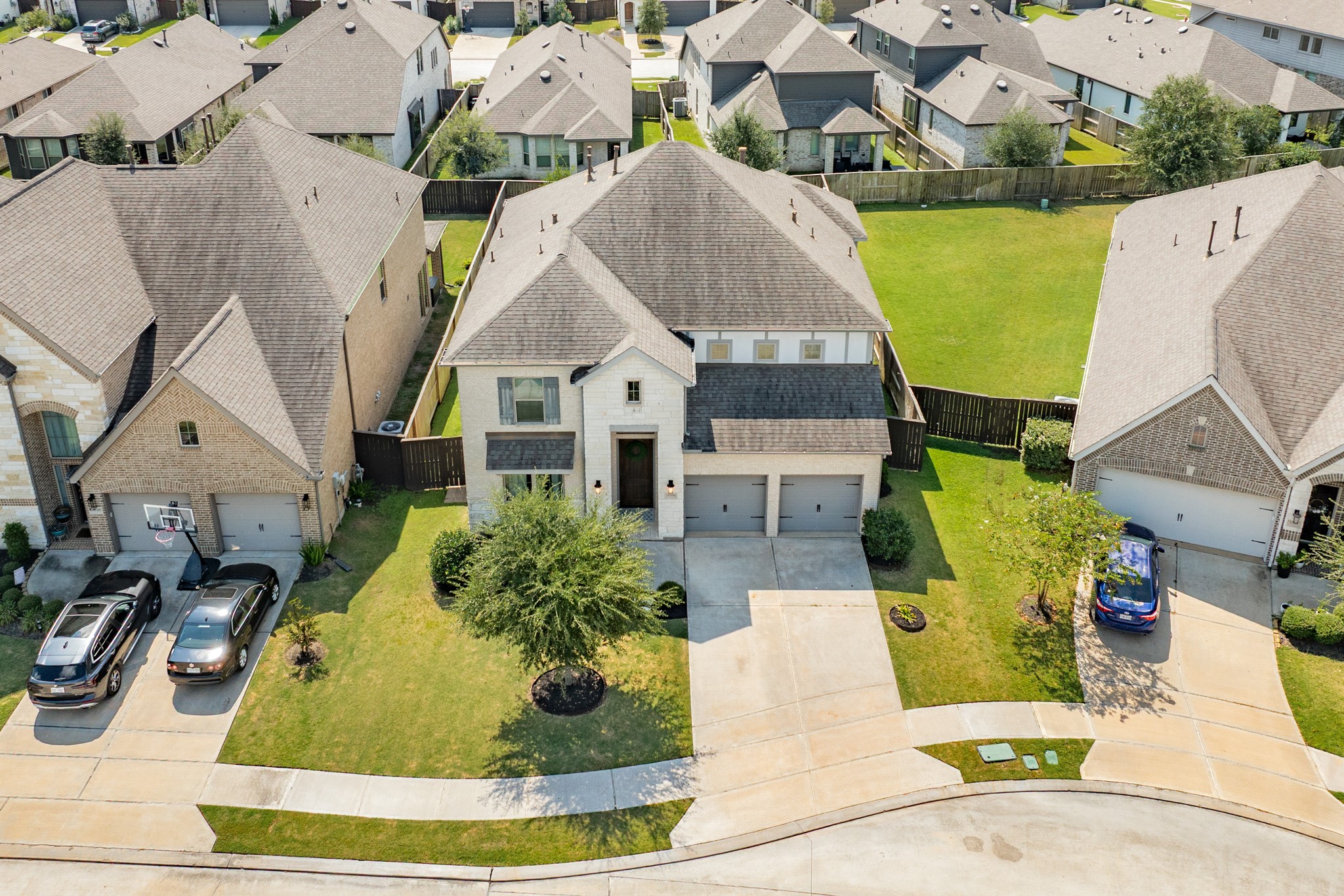 3706 Arpa Street Rosharon, TX 77583 - Photo 2 of 50 an aerial view of a house with a swimming pool
