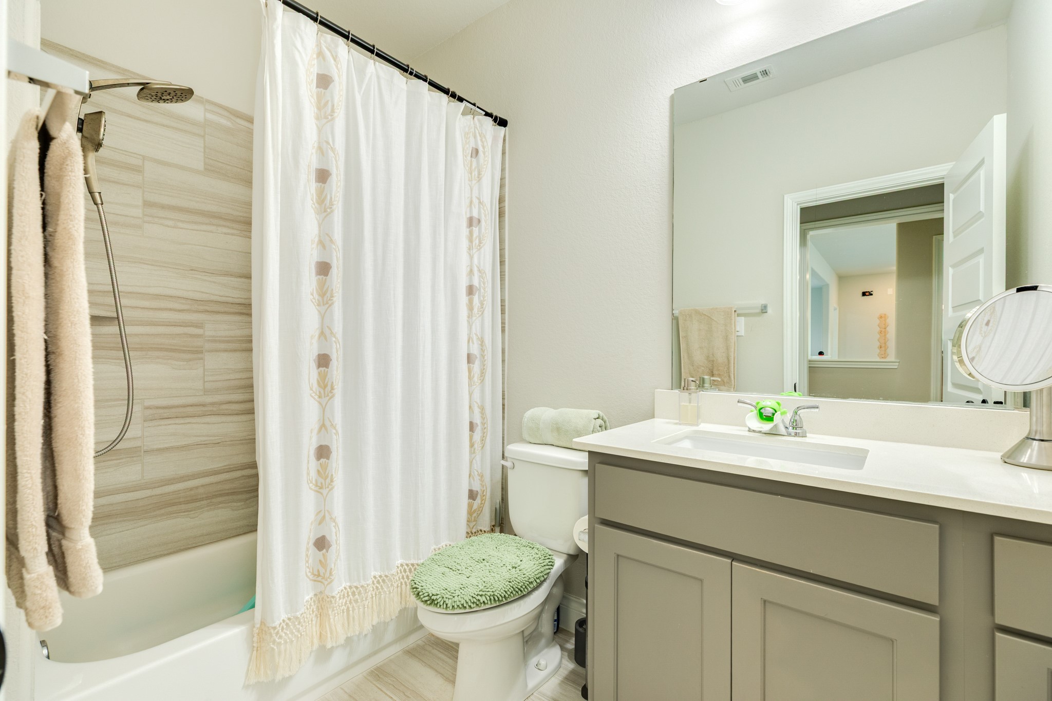 3706 Arpa Street Rosharon, TX 77583 - Photo 29 of 50 a bathroom with a sink and a mirror