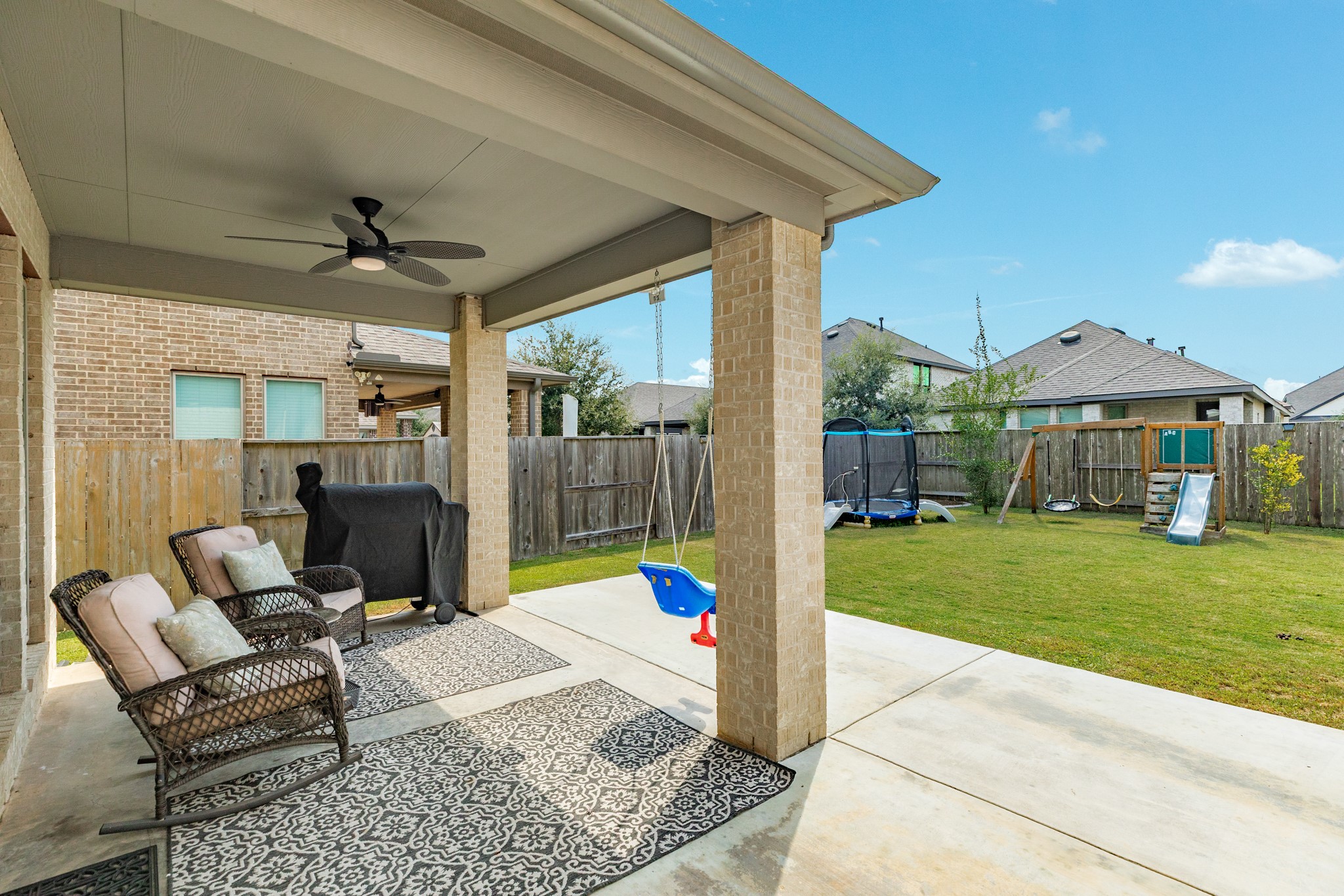 3706 Arpa Street Rosharon, TX 77583 - Photo 38 of 50 a view of a porch with furniture and a yard
