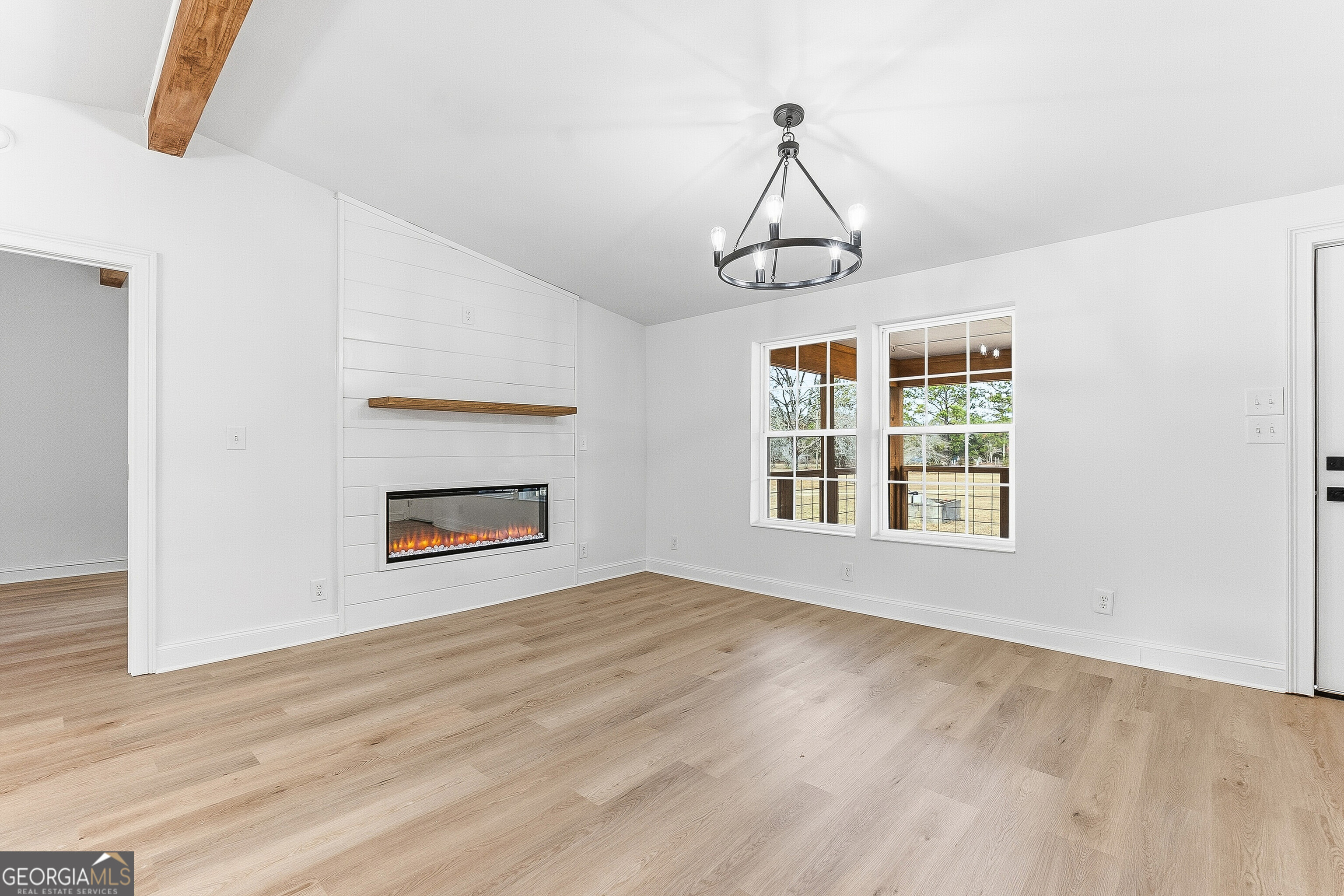 5393 Rogers Road Lizella, GA 31052 - Photo 17 of 52 a view of an empty room with a window