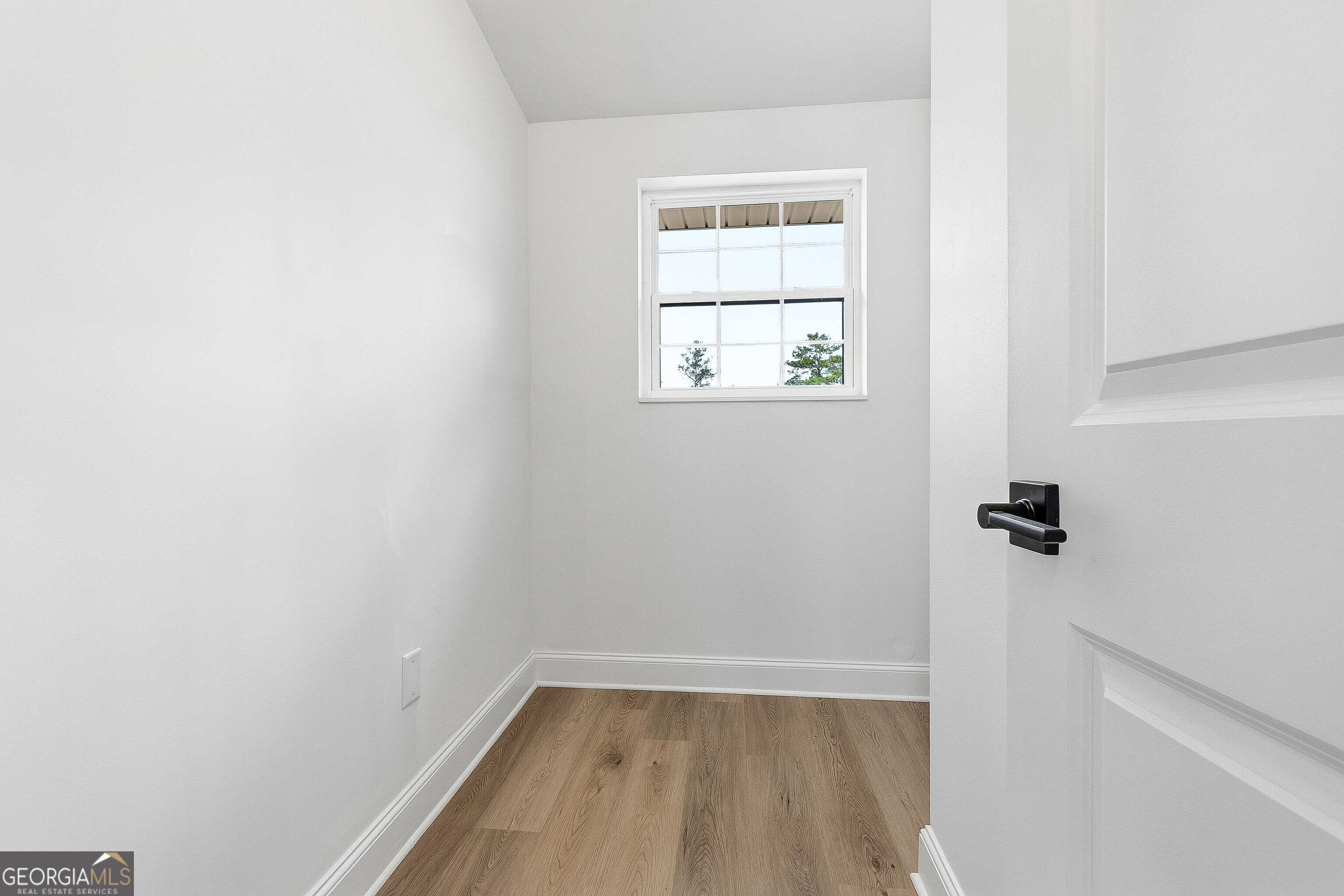 5393 Rogers Road Lizella, GA 31052 - Photo 28 of 52 an empty room with a window