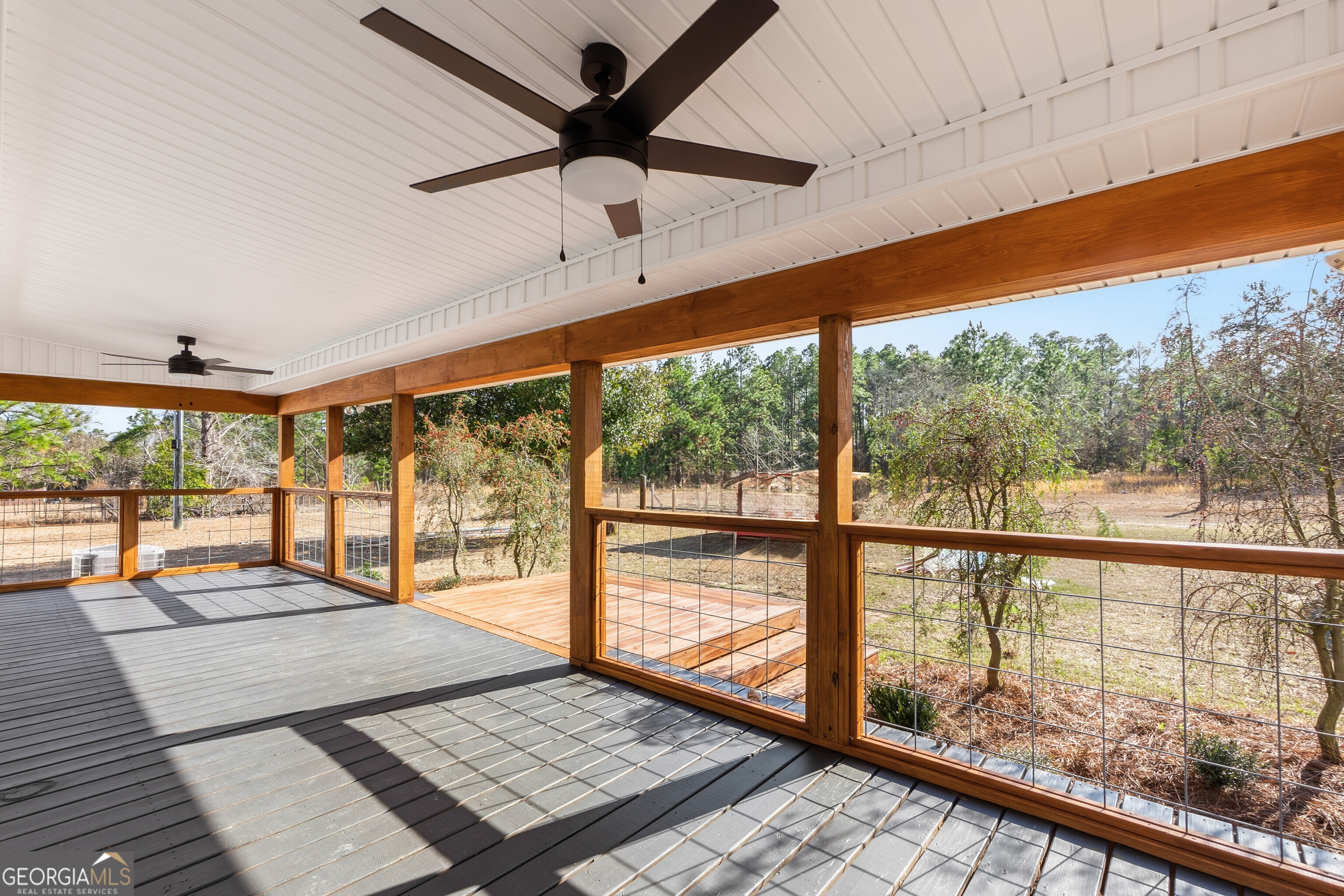 5393 Rogers Road Lizella, GA 31052 - Photo 35 of 52 a living room with large windows