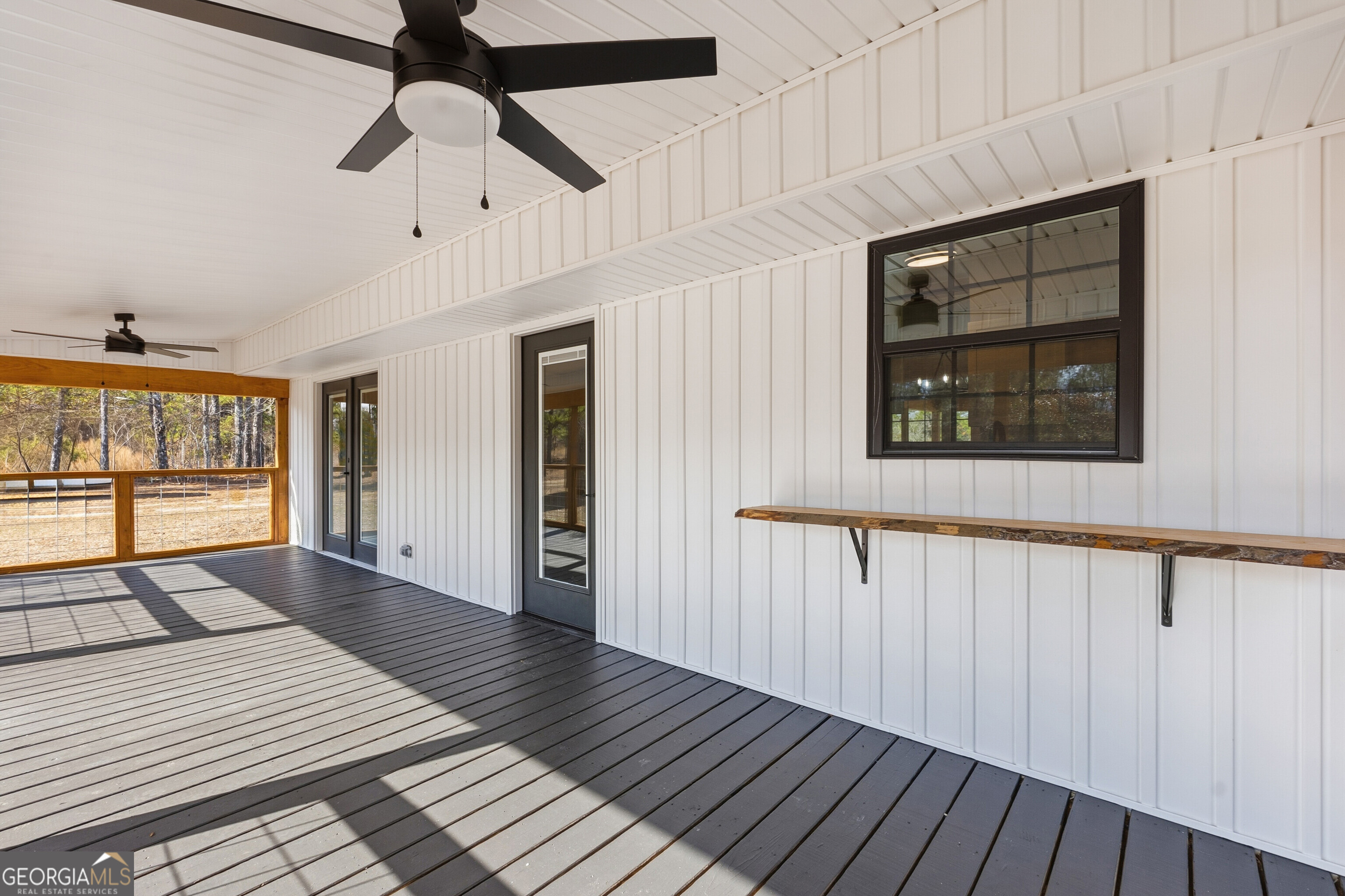 5393 Rogers Road Lizella, GA 31052 - Photo 36 of 52 a view of a room with wooden floor and windows