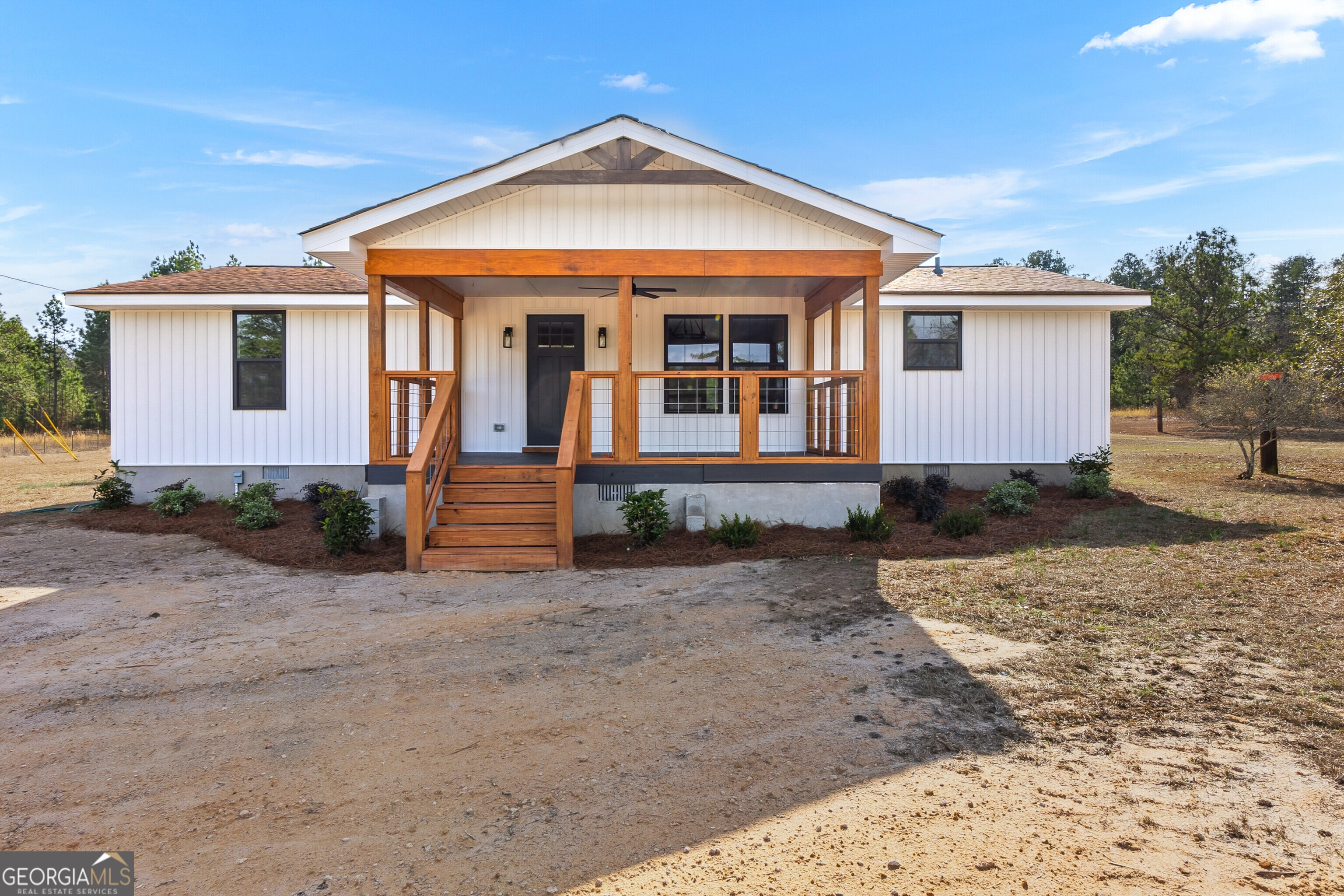 5393 Rogers Road Lizella, GA 31052 - Photo 41 of 52 front view of a house with a yard