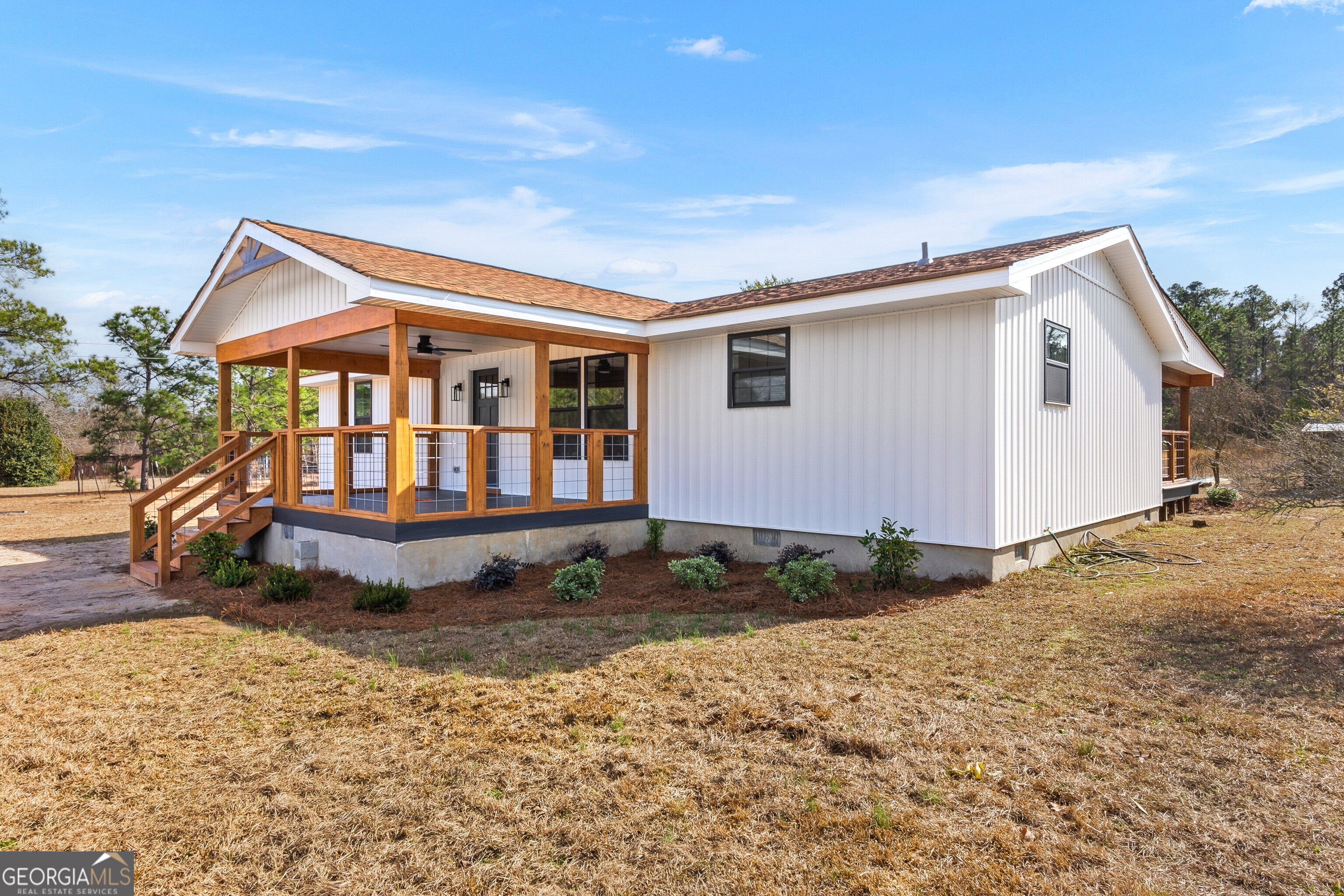 5393 Rogers Road Lizella, GA 31052 - Photo 42 of 52 a house view with a garden space
