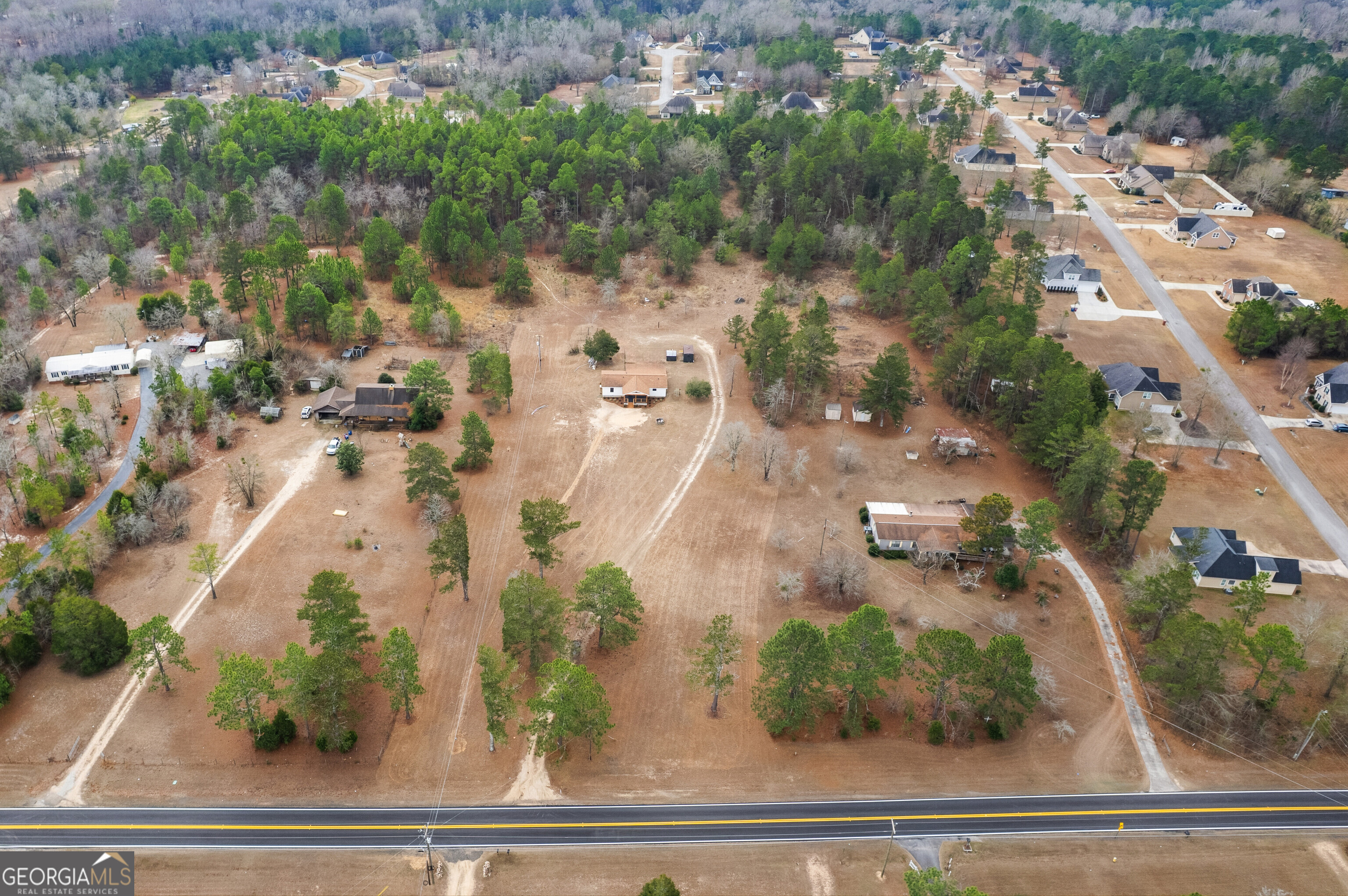 5393 Rogers Road Lizella, GA 31052 - Photo 43 of 52 an aerial view of residential houses with outdoor space