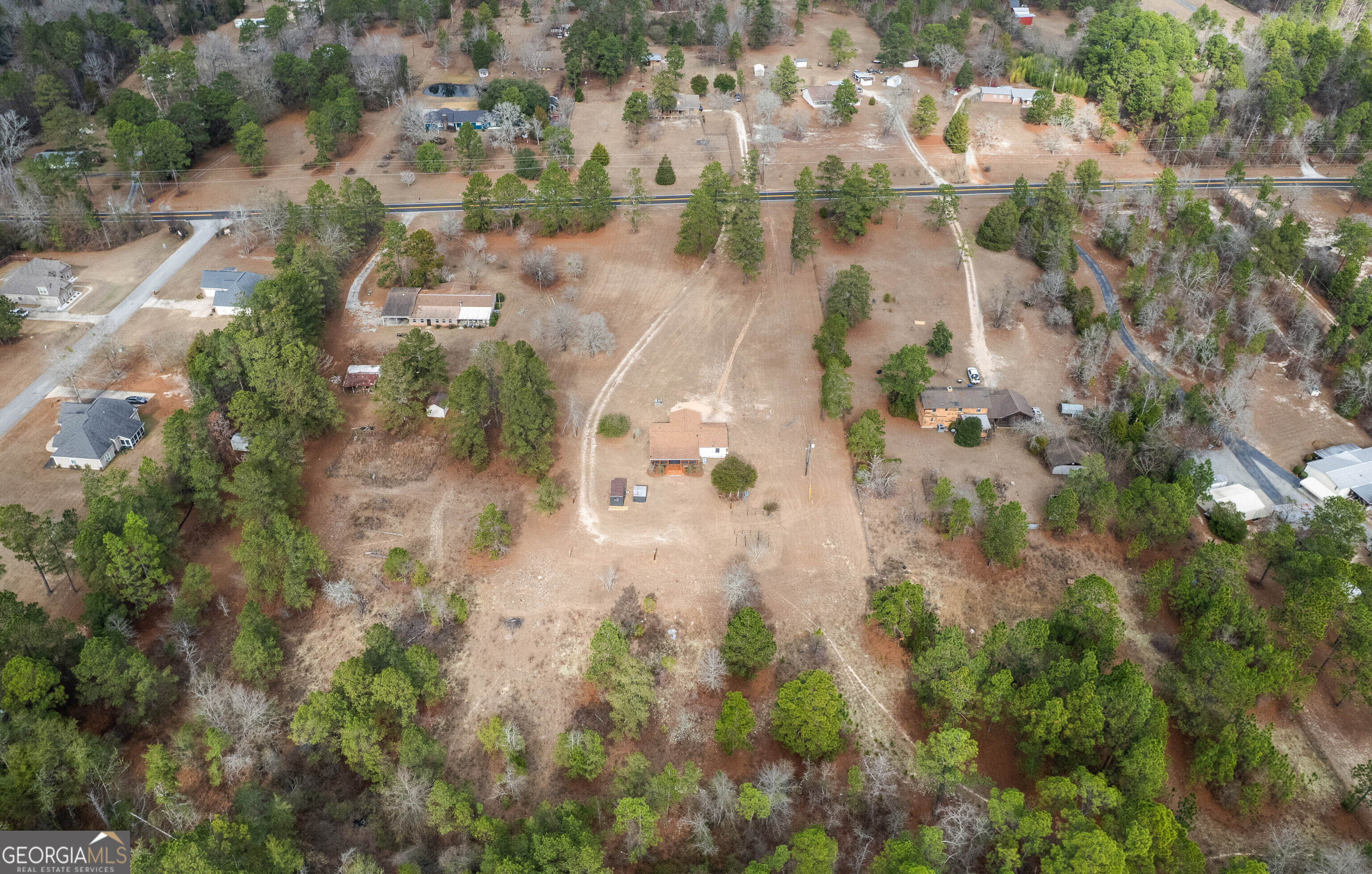5393 Rogers Road Lizella, GA 31052 - Photo 45 of 52 an aerial view of residential houses with outdoor space