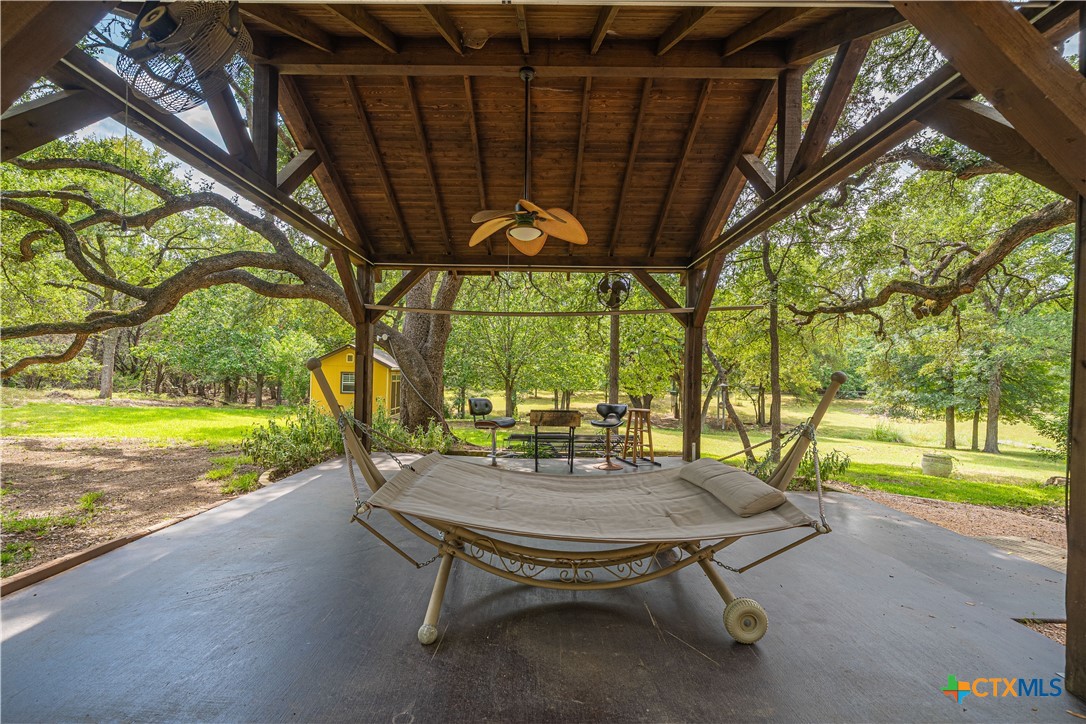 519 Long Meadow Spring Branch, TX 78070 - Photo 29 of 33 a view of a swimming pool with a porch and furniture