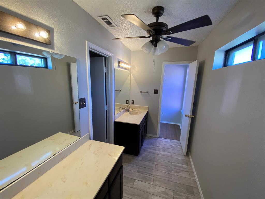 134 Main Place Euless, TX 76040 - Photo 12 of 25 a very nice looking room with a wooden floor