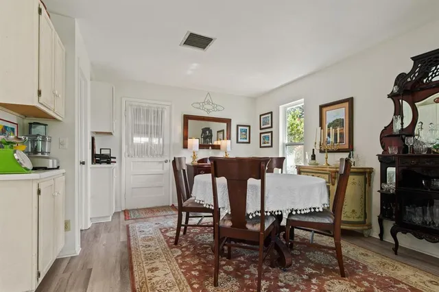 a view of a dining room with furniture