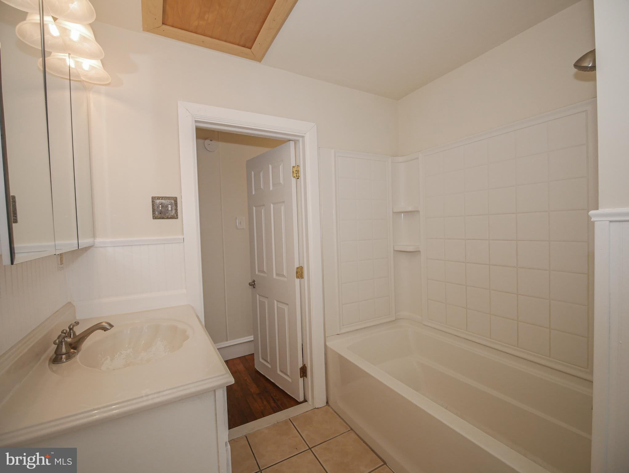 332 Crown Point Road Thorofare, NJ 08086 - Photo 27 of 36 a bathroom with a sink a toilet and shower