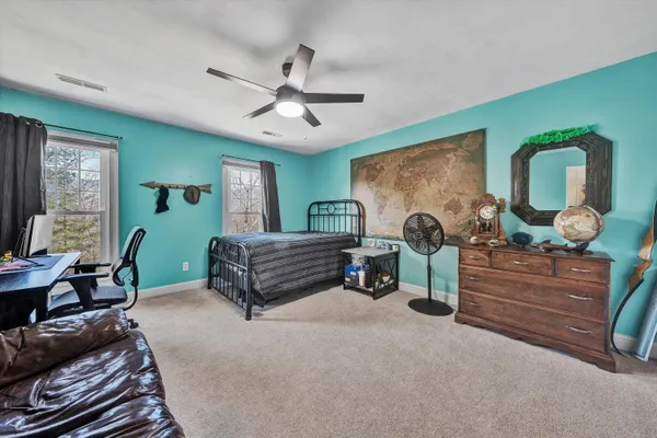 a view of an empty room and closet area