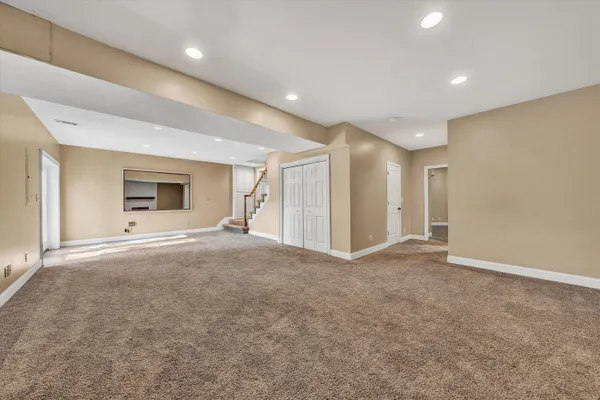 a front view of a house with a garage