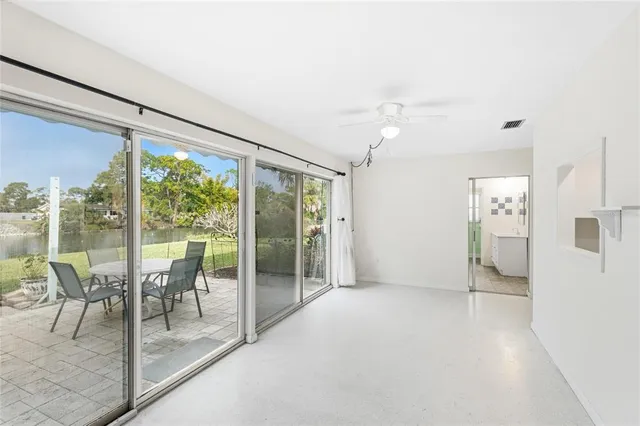 a bathroom with a sink a mirror and a shower