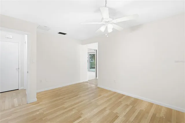 a view of a chairs and table in patio