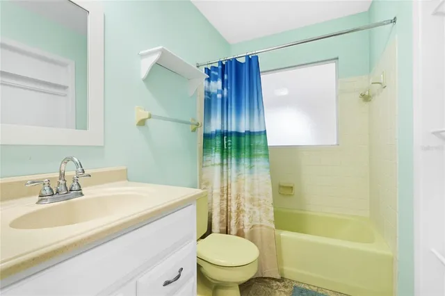 a view of a house with a garden