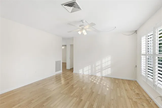 a kitchen with granite countertop a stove top oven and sink