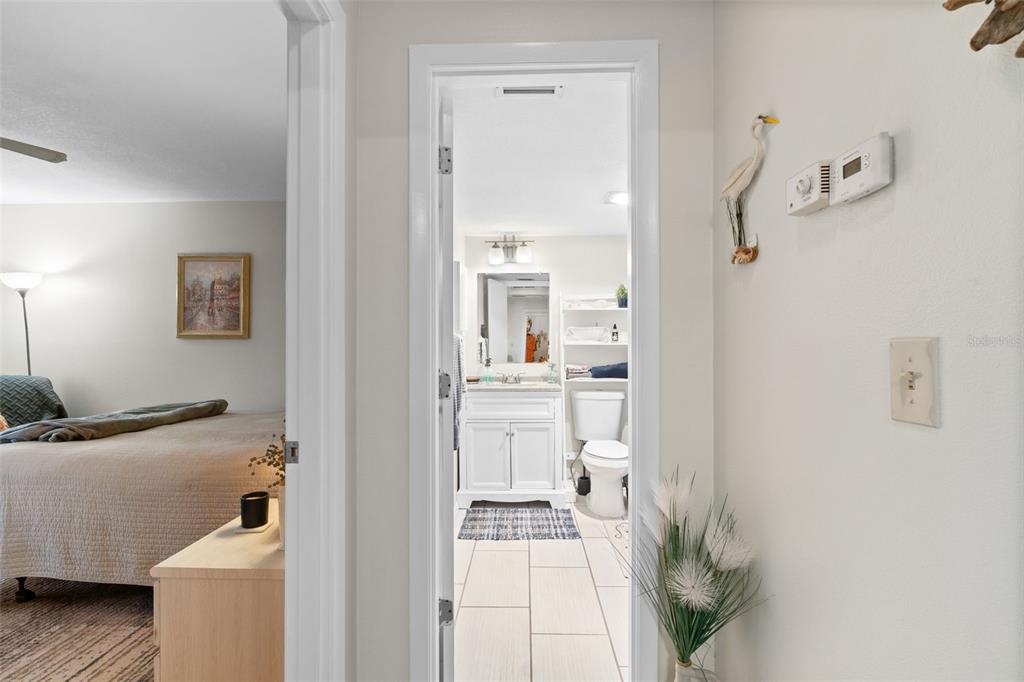 4260 Placida Road, Unit 17A Englewood, FL 34224 - Photo 21 of 34 a bathroom with a sink and a mirror