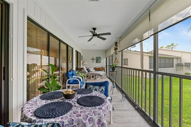 a room with furniture and a large window