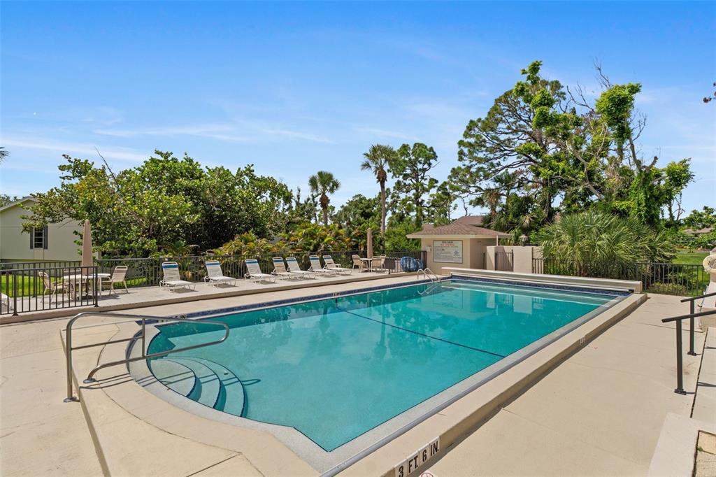 4260 Placida Road, Unit 17A Englewood, FL 34224 - Photo 5 of 34 a view of a swimming pool with a patio