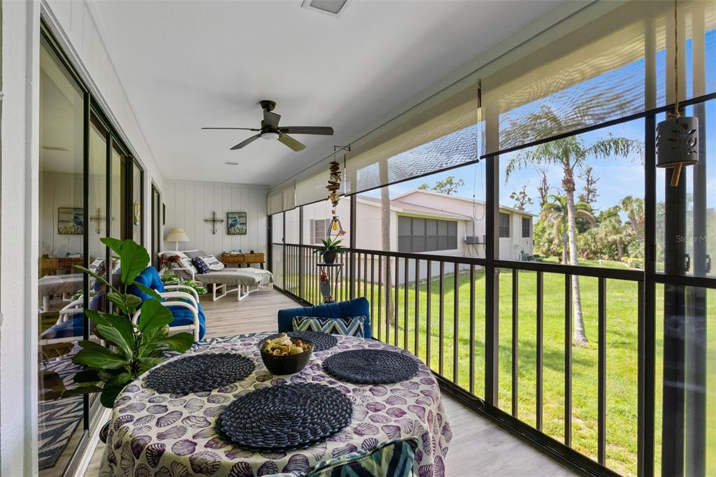 4260 Placida Road, Unit 17A Englewood, FL 34224 - Photo 6 of 34 a living room with furniture and a large window