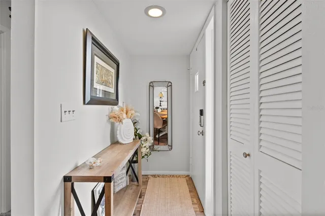 a room that has a bed and a chair in it