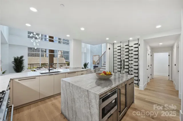 a kitchen with stove and cabinets