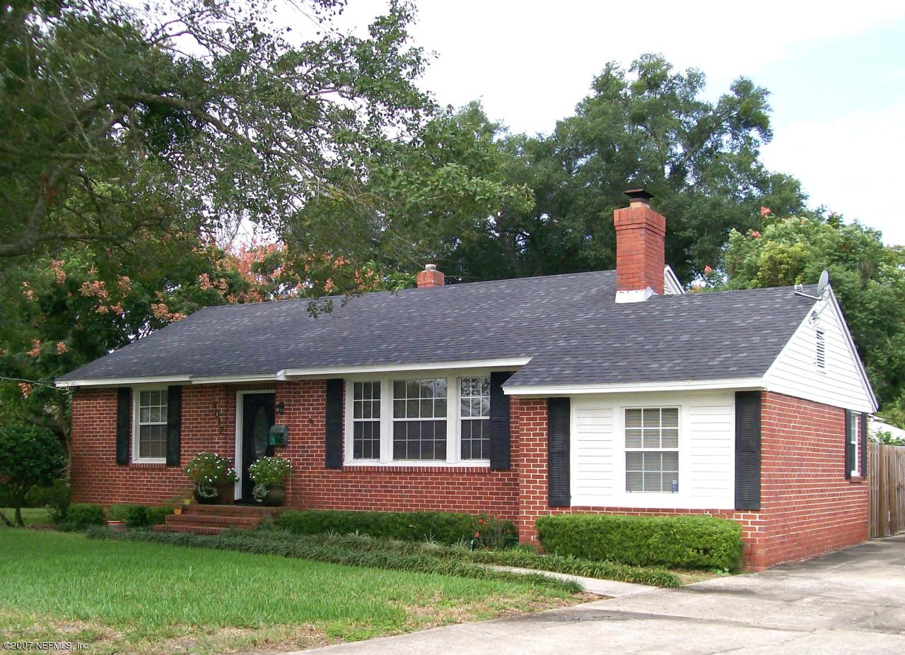 4012 Dover Road Jacksonville, FL 32207 - Photo 1 of 20 a front view of a house with a yard and tree