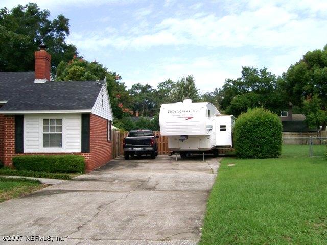 4012 Dover Road Jacksonville, FL 32207 - Photo 19 of 20 a view of a house with a yard and sitting area