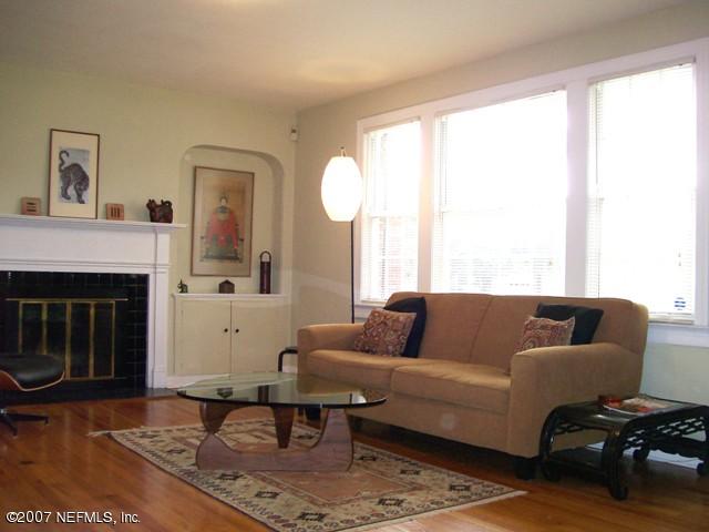 4012 Dover Road Jacksonville, FL 32207 - Photo 4 of 20 a living room with furniture and a fireplace