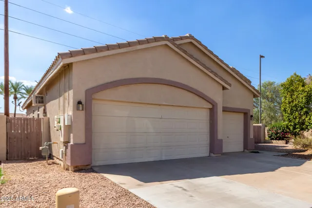 a view of a house with a garage