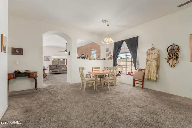 a view of a livingroom with furniture and window