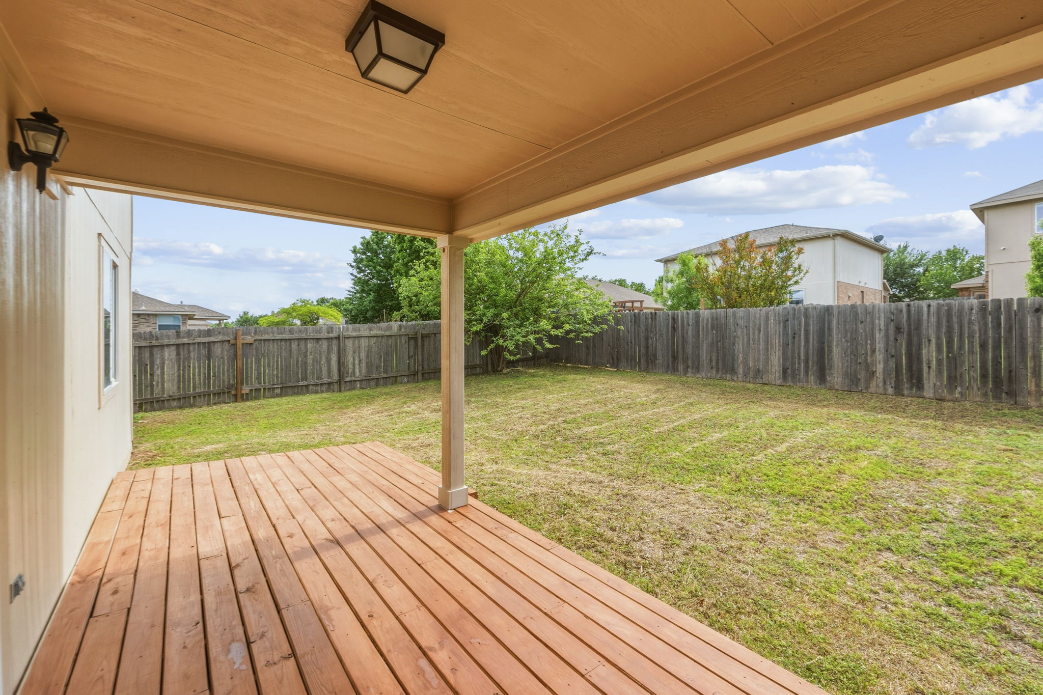 211 Banner Avenue Leander, TX 78641 - Photo 25 of 27 a view of deck with wooden floor and outdoor space