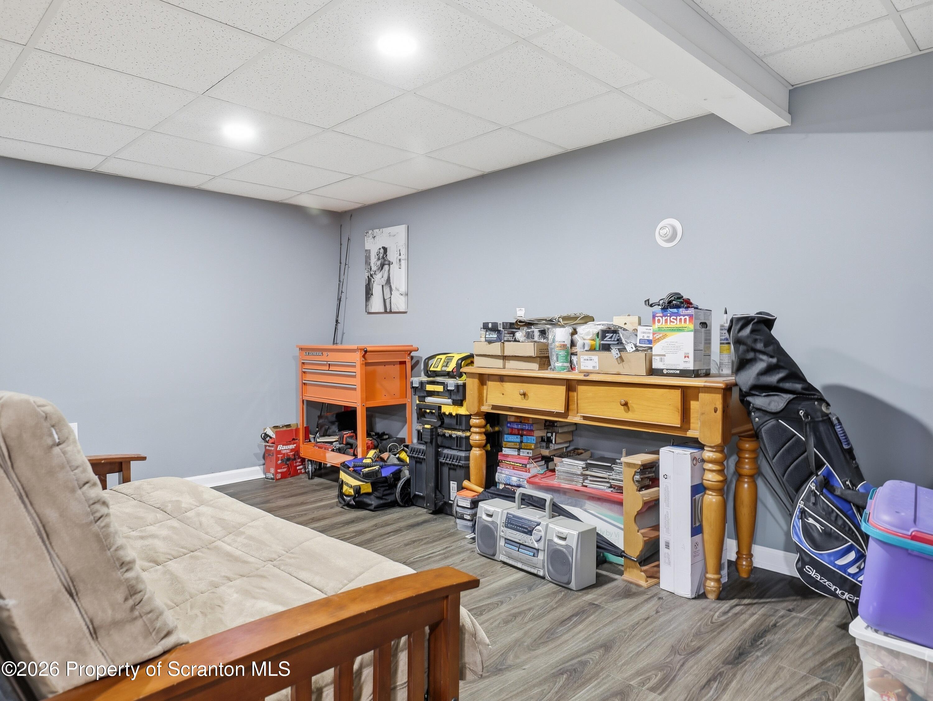 1237 Heart Lake Road Scott Township, PA 18433 - Photo 20 of 39 a bed room with furniture and a flat screen tv