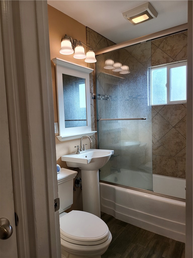 6636 Granger Avenue Bell Gardens, CA 90201 - Photo 11 of 11 a bathroom with a sink a toilet and shower