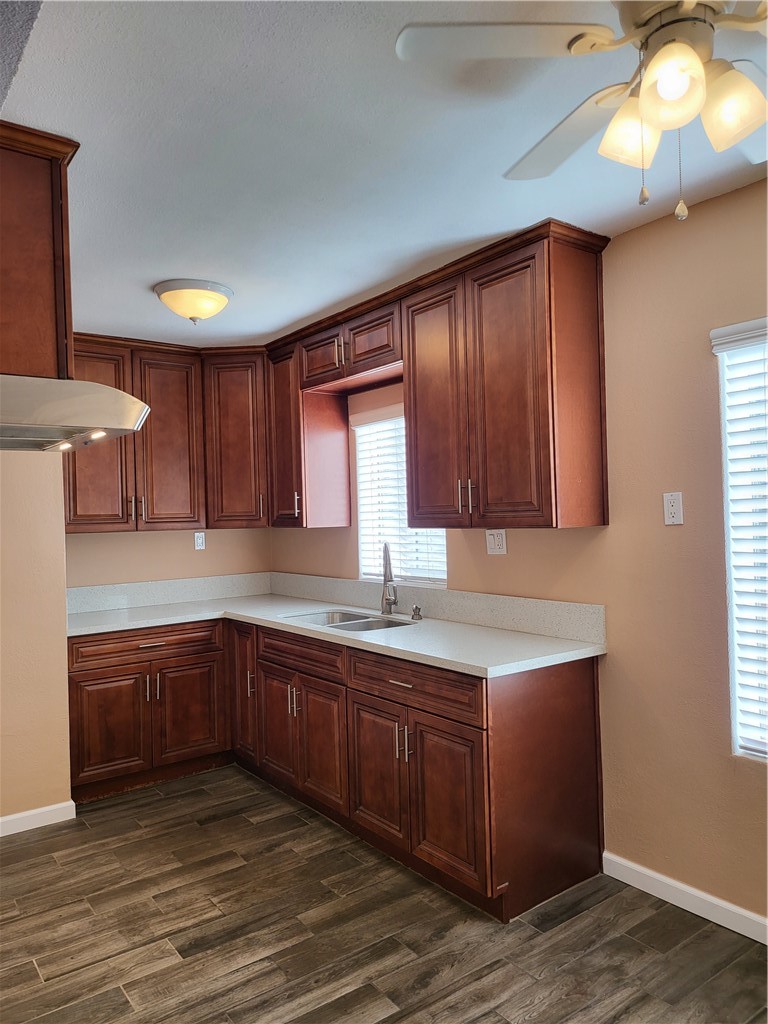6636 Granger Avenue Bell Gardens, CA 90201 - Photo 5 of 11 a kitchen with sink and cabinets