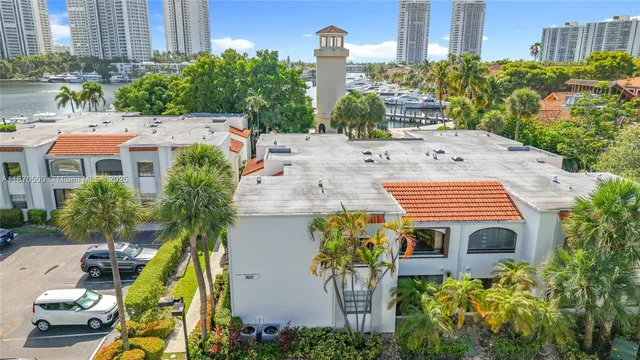 a aerial view of a house with swimming pool and garden