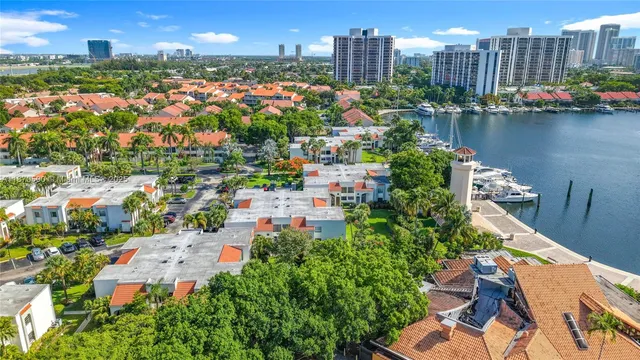an aerial view of residential houses and outdoor space