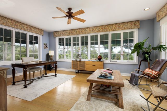 a view of a swimming pool with a garden