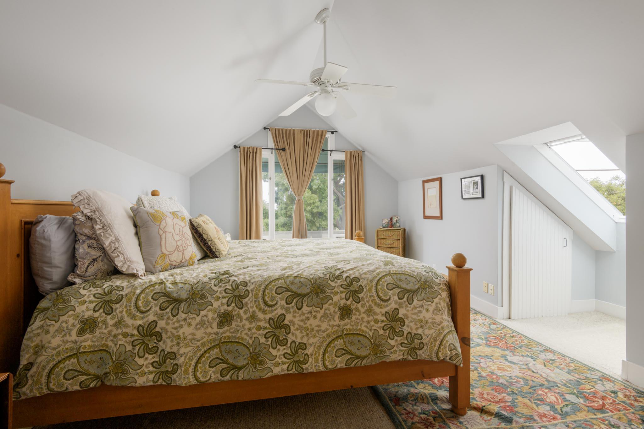 1833 Santa Barbara Street Santa Barbara, CA 93101 - Photo 20 of 35 a bedroom with a bed and window