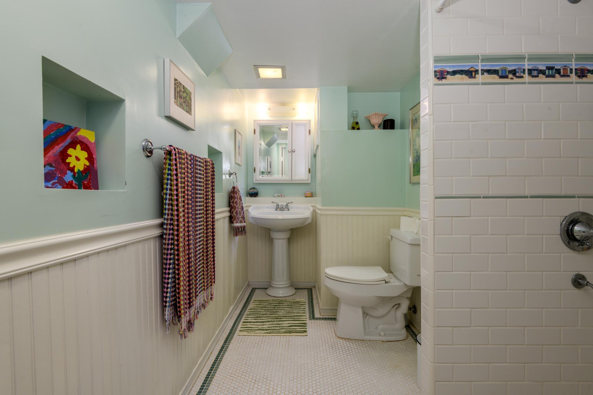 1833 Santa Barbara Street Santa Barbara, CA 93101 - Photo 25 of 35 a bathroom with a toilet and a shower