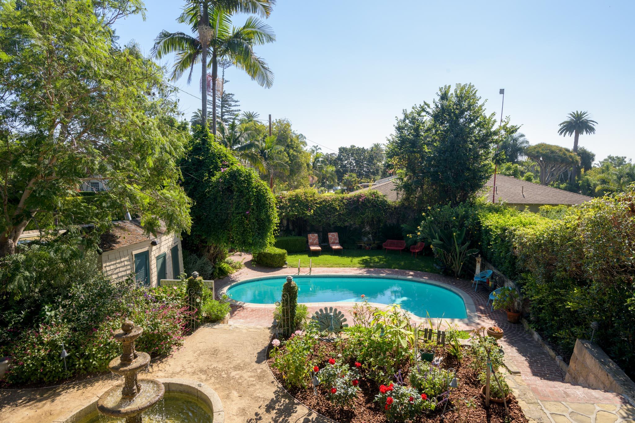 1833 Santa Barbara Street Santa Barbara, CA 93101 - Photo 26 of 35 a view of a swimming pool with a garden